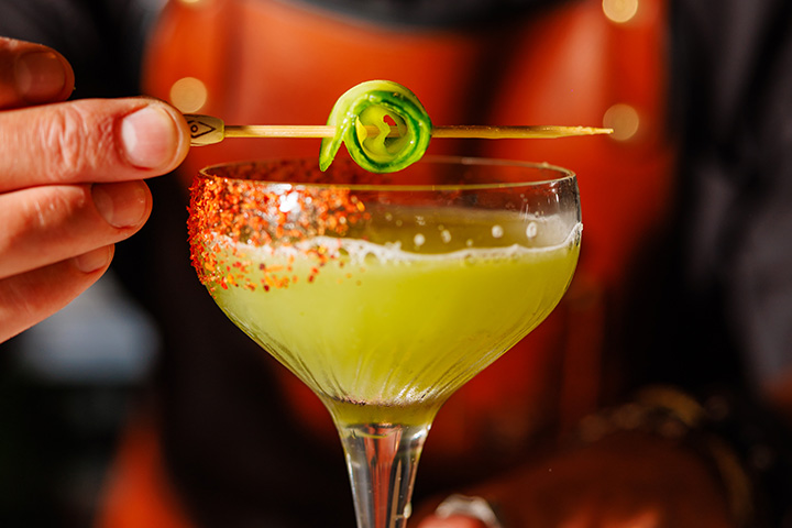 Get Ready for a Wicked Feast: Green Bites and Sips to Elevate Your Night Out!