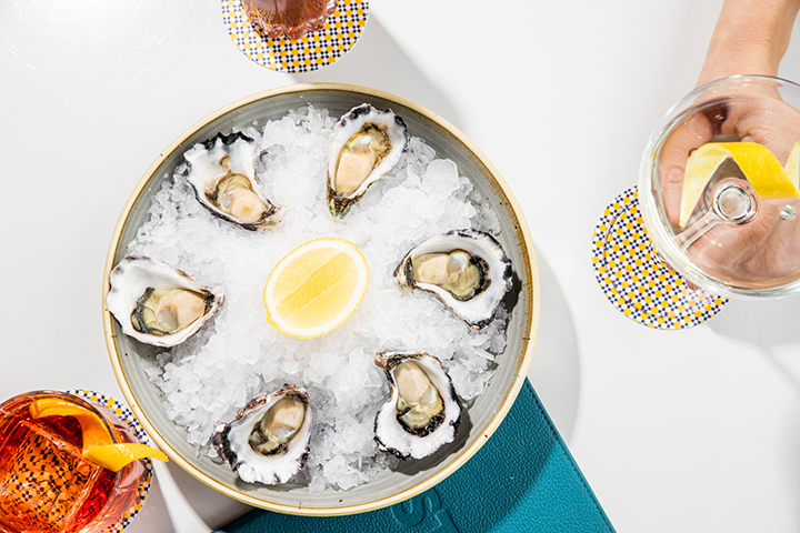 PSA OTTO Osteria Has Two New Luxe Seafood Snacking and Sipping Experiences!
